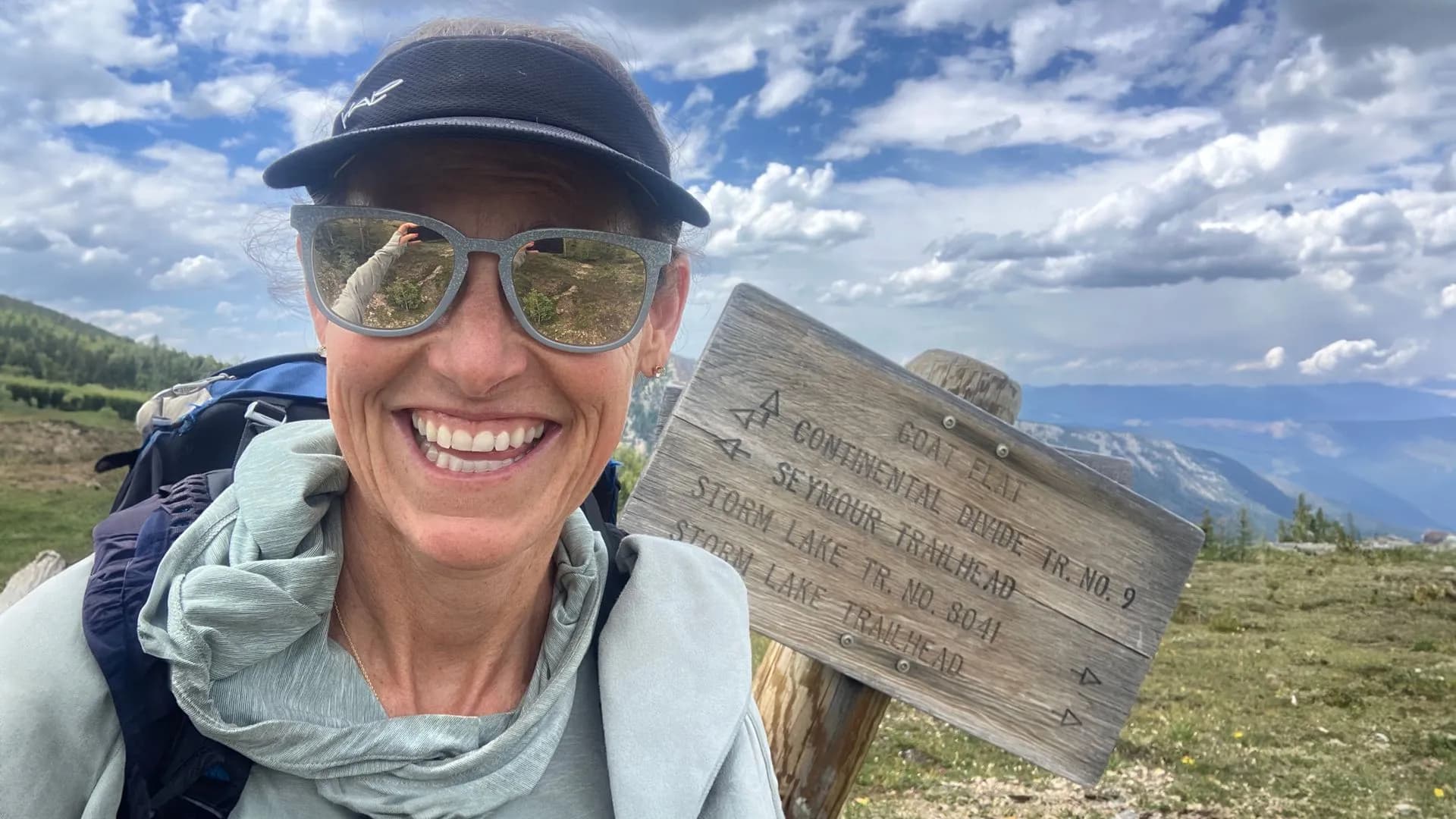 Amy Mann at the goat flat sign