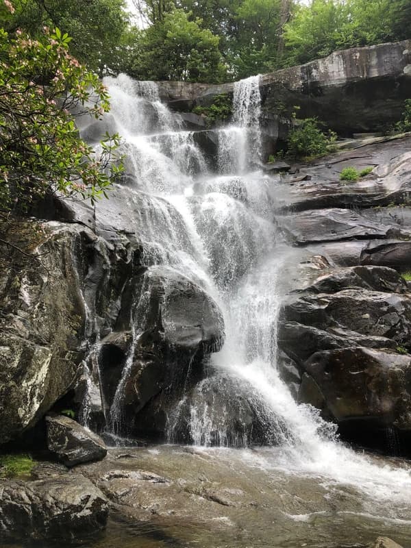 a small cascading waterfall on solid rocks
