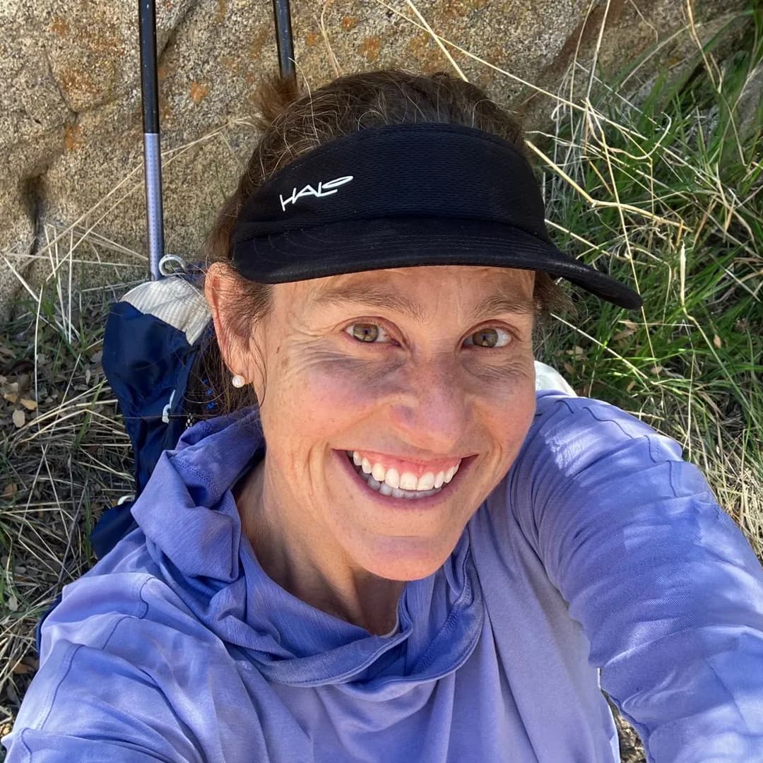 Amy Mann relaxing in the grass