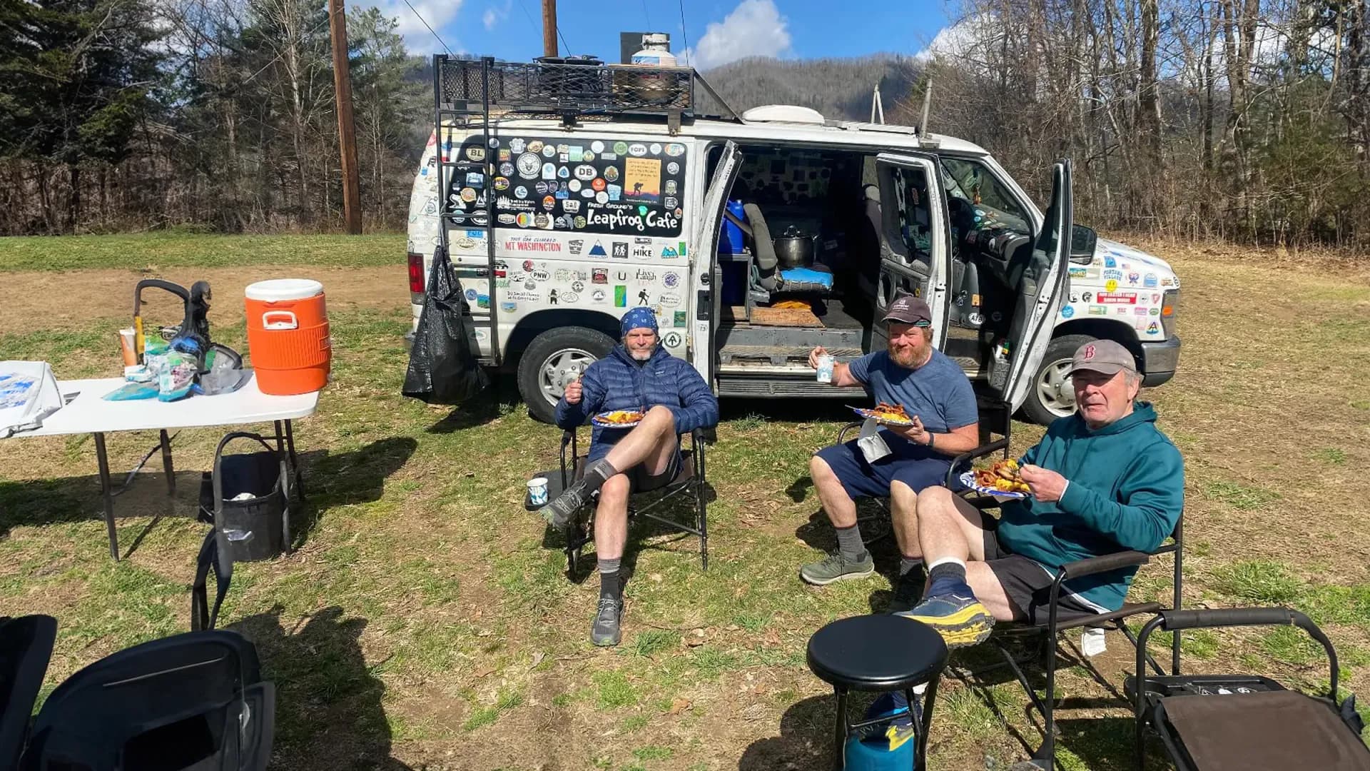 Tim Davis relaxing by his van